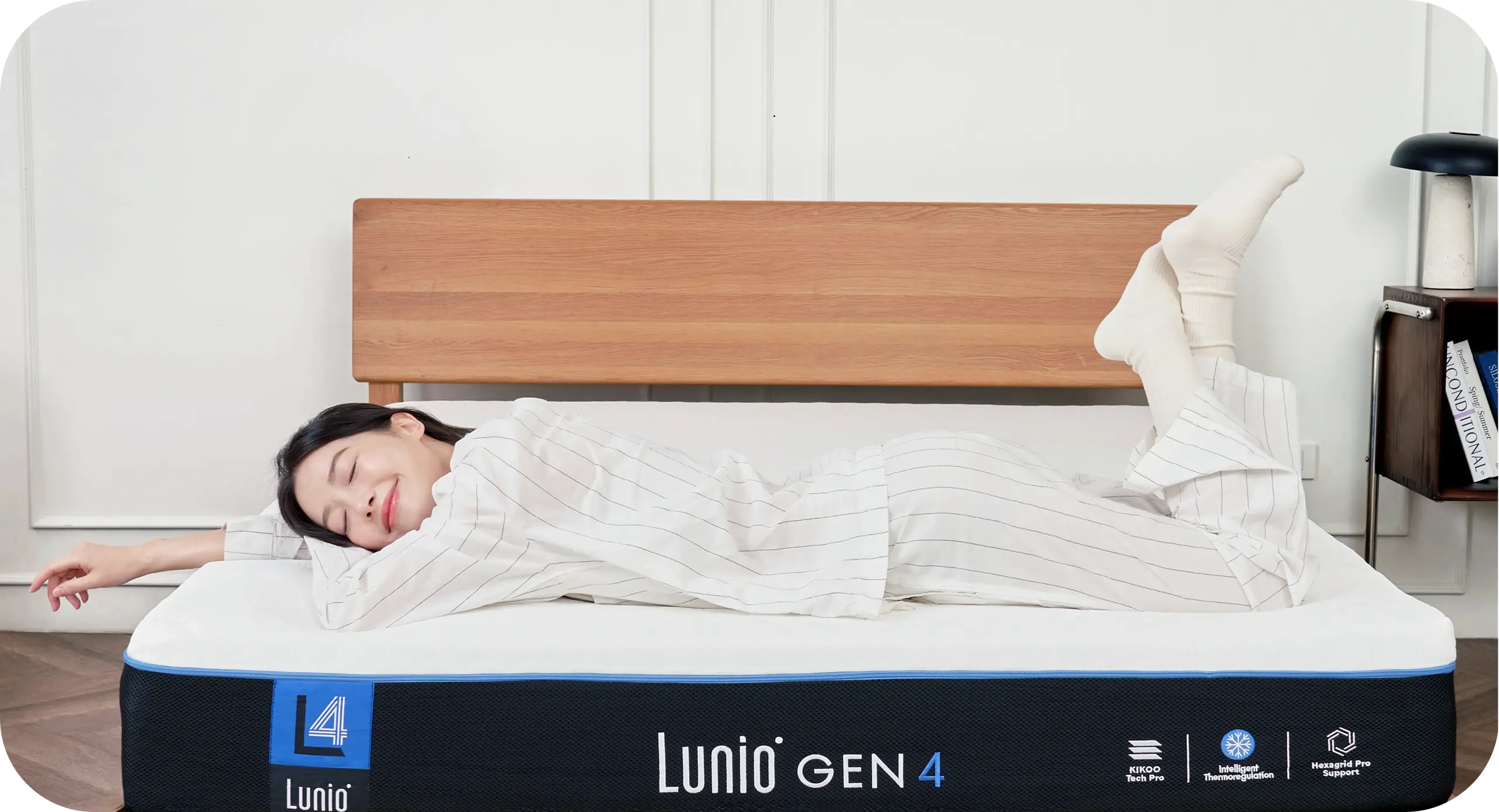 在 Lunio Gen 4 石墨烯乳膠床墊上安然熟睡的生活照 — 讓身體在夜晚深層修復